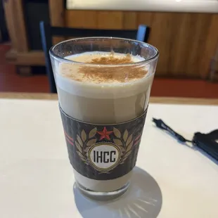 Latte with cinnamon on top