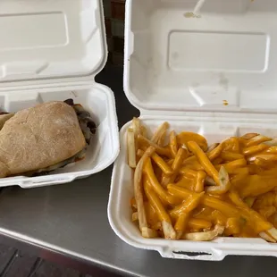 Philly sandwich and cheese fries.