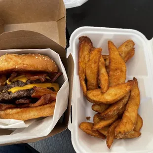 Double bacon cheeseburger with potato wedges