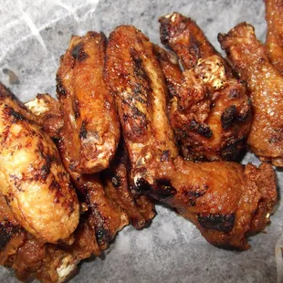 a pile of chicken wings