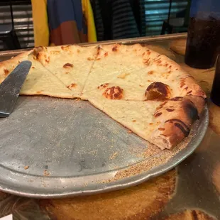 Cheese pizza unfortunately with no sauce
