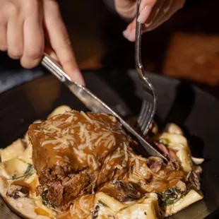 Beef Shortrib Stroganoff
mushroom and spinach, pappardelle, house gravy,
parmesan cheese