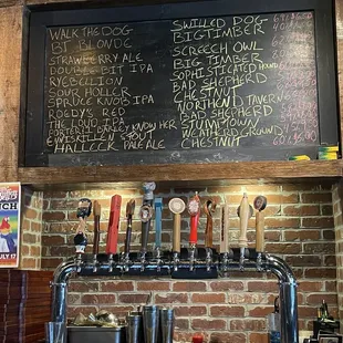 a menu on a brick wall