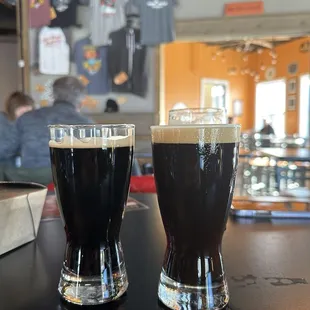 16 Hands stout on the left and Mailies milk stout nitro on the right, with a Riva&apos;s peaking in the back