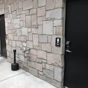Found the bathrooms. You just have to step outside and around back.