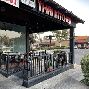 Outside: patio seating wraps around the corner of the restaurant