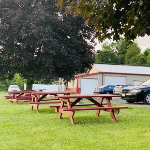 Picnic Tables outside across parking lot