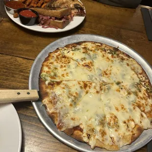 Reuben and goat named basil pizza