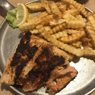 Grilled salmon and fries.