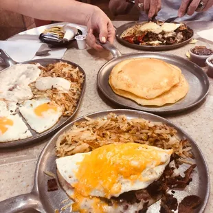 a table full of breakfast foods