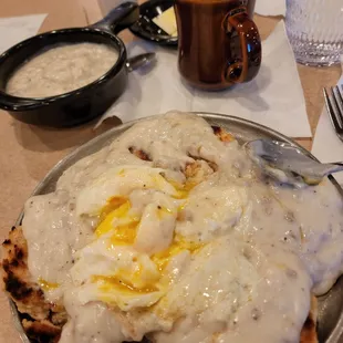 04/02/21 Southern traditional. two biscuits grilled sausage gravy two eggs over medium plopped on top.  coffee
