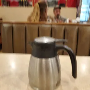 The pot of individual coffee.