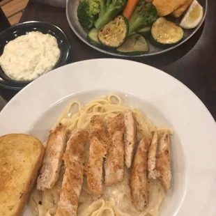 Fresh and hot, fried fish w/ medley veggies. The chicken Alfredo pasta was a bit on the bland side.