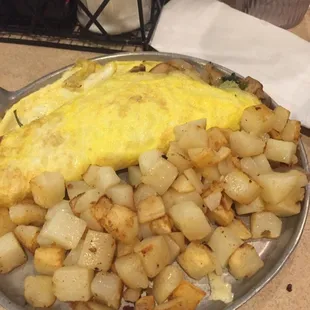 Veggie omelette. Eggs with fillings in the middle not necessarily cooked in the egg