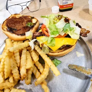 Little A1 into a yummer's bacon cheeseburger with some nice yummy crinkle fries