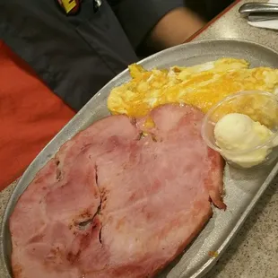 Ham steak scrambled eggs with Cheddar cheese