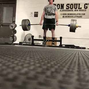 Here's a photo of myself making good use of one of the many deadlift pads in the facility.