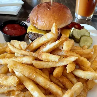 Bacon cheeseburger and a mountain of French fries