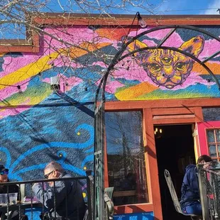 Outside mural in patio area where dogs are allowed