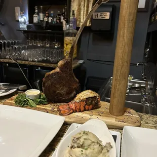 tomahawk, lobster tail &amp; mash