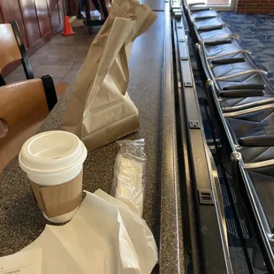 Charging stations are behind the coffee stand at Concourse B