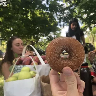 Enjoying our donut reward and resting after picking in the heat