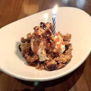 Oatmeal Raisin Cookie Crumble. Warm, crunchy oatmeal raisin cookies with ice cream, and a slight kick of bourbon caramel.