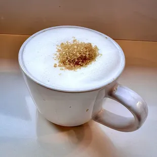 A Cappuccino (added sugar on top).