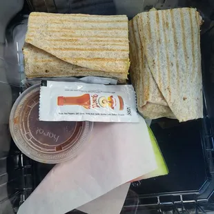 Breakfast burrito with watermelon slice