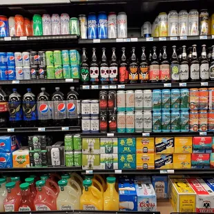 a variety of sodas and soft drinks