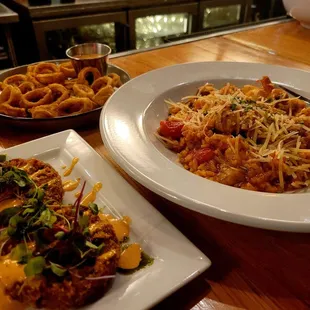 Calamari, crab cakes, and cajun risotto