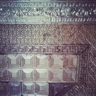 Vintage metal ceiling in Masonic Church bathroom