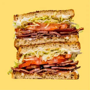 BLT Sandwich - Applewood smoked bacon, mayo, lettuce, tomato, on toasted rye bread.