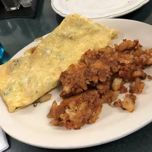 Veggie omelet..home fries well done