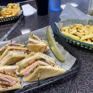 Club sandwich with fries