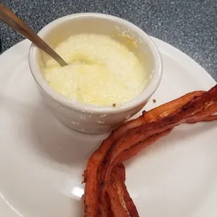 Buttered grits and side of bacon