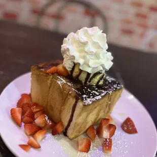 Honey toast w/ ice cream,strawberry, chocolate syrup