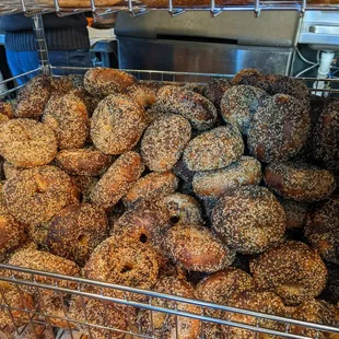 a wire basket full of bagels