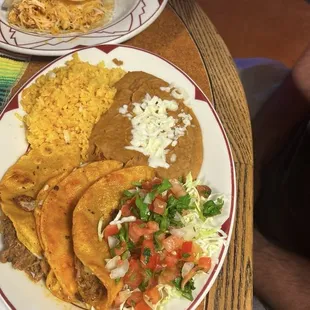 Birria.tacos $14.99  Extra for the consommé dipping sauce I think it was $1.49 but two people shared  one bowl