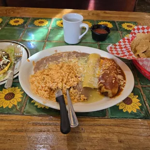 Red tamale, carne asada torta, chicken enchilada combination