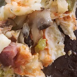 Raw dough and raw ingredients from can.. the mushroom is marinated from can