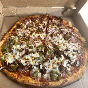 King Richard Pizza and half sausage onion and peppers