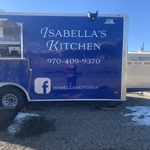 a food truck parked in a parking lot