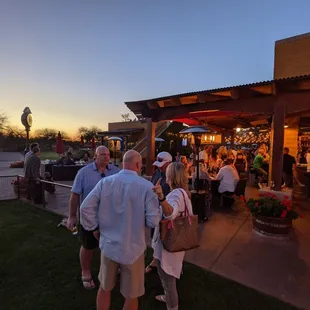 a group of people standing outside