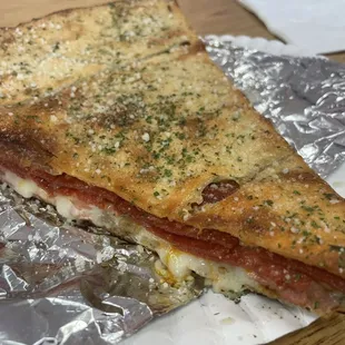 Meat Stuffed Pizza Slice. I actually like it crispy so I'm glad it arrived in this condition.  Kills all the baddies too.