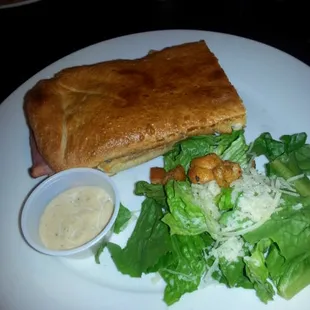 Lunch muffaletta with Caesar salad