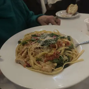 I don't know the name. Fat noodles with chicken and broccoli. There was hardly any chicken, huge serving,