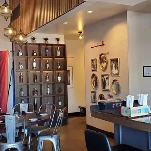 a bar with a colorful curtain