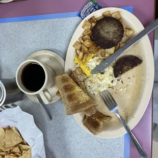 Eggs, sausage, fries, toast, coffee. Yum.