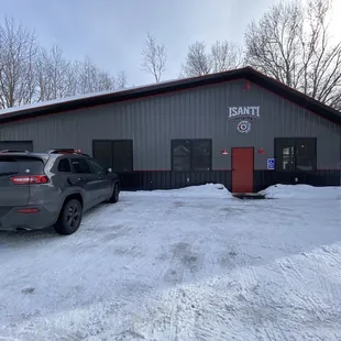 a car parked in front of a building